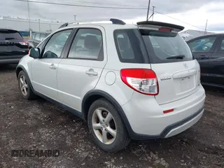 2008 Suzuki SX4 with VIN JS2YB417185102170, listed as a IAAI auction lot 42005896 with 131,810 mi miles. Bid and sale history available at carsss.com. Image 3.