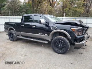 2017 Nissan Titan XD SL with VIN 1N6AA1F41HN548361, listed as a Copart auction lot 84654174 with 142,057 mi miles and Salvage Title. Bid and sale history available at carsss.com. Image 4.