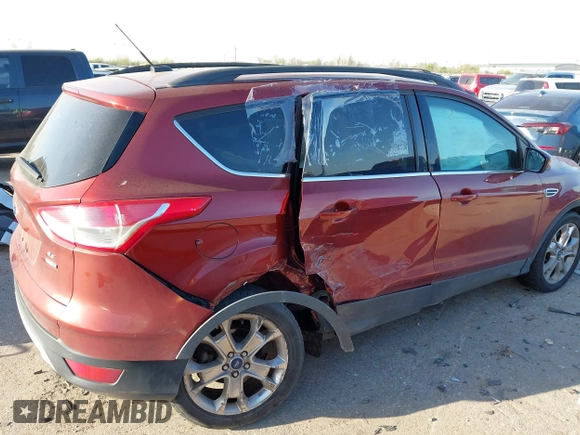 2015 Ford Escape SE with VIN 1FMCU9G93FUC32776, listed as a IAAI auction lot 41849714 with 135,875 mi miles. Bid and sale history available at carsss.com. Image 6.