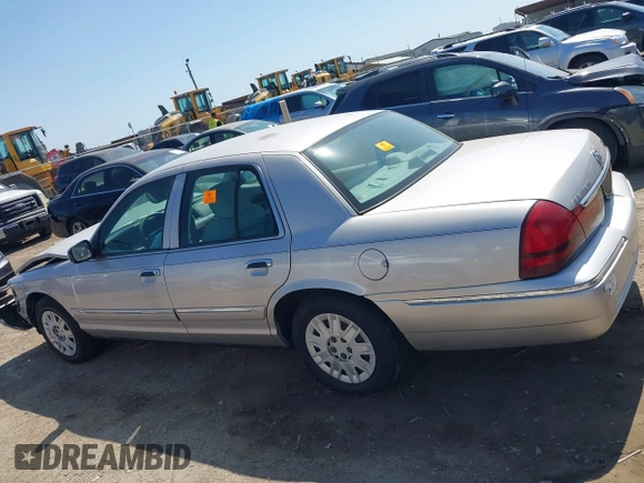 2005 Mercury Grand Marquis GS with VIN 2MEFM74W05X653375, listed as a IAAI auction lot 41995502 with 200,083 mi miles and . Bid and sale history available at DreamBid. Image 14.