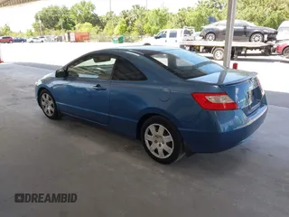 2008 Honda Civic Cpe LX with VIN 2HGFG12698H573436, listed as a IAAI auction lot 41970955 with 142,166 mi miles. Bid and sale history available at carsss.com. Image 3.