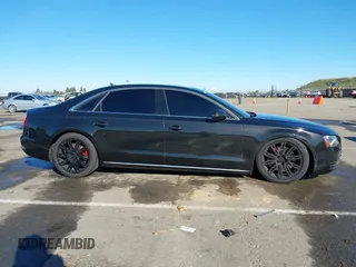 2011 Audi A8 z VIN WAURVAFD6BN019339, wystawiony jako IAAI lot #41560306 z przebiegiem 123 726 mil mil oraz . Historia ofert i sprzedaży dostępna na DreamBid. Obrazek 13.