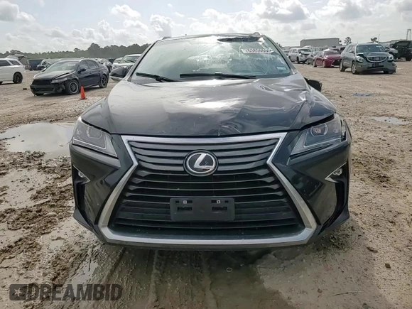 2016 Lexus RX 350 с VIN 2T2ZZMCA9GC001717, выставлен на аукционе Copart как лот 63850605 с пробегом 74 609 миль миль и Списание • Salvage title. История ставок и продаж доступна на DreamBid. Изображение 14.