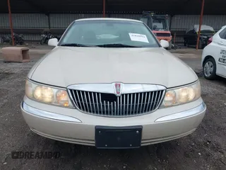 1999 Lincoln Continental with VIN 1LNHM97V1XY691852, listed as a IAAI auction lot 41820994 with 98,858 mi miles and . Bid and sale history available at DreamBid. Image 6.