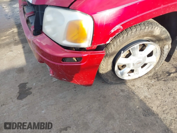 2005 GMC Envoy SLT z VIN 1GKET16M956158147, wystawiony jako IAAI lot #41683236 z przebiegiem Nie podano mil oraz . Historia ofert i sprzedaży dostępna na DreamBid. Obrazek 6.