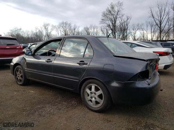2004 Mitsubishi Lancer LS with VIN JA3AJ36E34U036316, listed as a Copart auction lot 87617655 with 140,855 mi miles and Salvage Title. Bid and sale history available at carsss.com. Image 2.