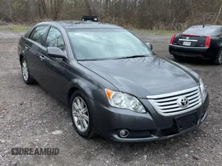 2010 Toyota Avalon XL with VIN 4T1BK3DB5AU353288, listed as a Copart auction lot 56857935 with 233,775 mi miles and Clean Title. Bid and sale history available at DreamBid. Image 1.