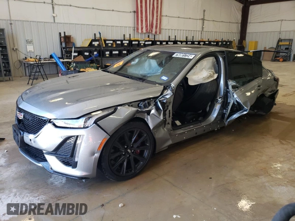 2023 Cadillac CT5 Sport z VIN 1G6DP5RK3P0119754, wystawiony jako Copart lot #79301724 z przebiegiem 29 229 mil mil oraz Czysty tytuł • Clean title. Historia ofert i sprzedaży dostępna na DreamBid. Obrazek 1.