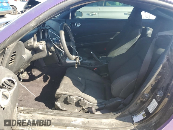 2005 Nissan 350Z with VIN JN1AZ34D05M608841, listed as a Copart auction lot 70408954 with 226,812 mi miles and Salvage Title. Bid and sale history available at DreamBid. Image 7.