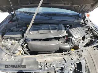 2018 Dodge Durango SXT with VIN 1C4RDJAG0JC329682, listed as a Copart auction lot 49541005 with 102,596 mi miles and Salvage Title. Bid and sale history available at DreamBid. Image 13.