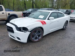 2014 Dodge Charger SXT z VIN 2C3CDXHG9EH162406, wystawiony jako IAAI lot #42159901 z przebiegiem 139 138 mil mil oraz . Historia ofert i sprzedaży dostępna na DreamBid. Obrazek 2.