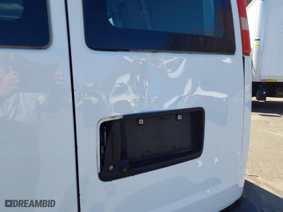 2017 Chevrolet Express Cargo Van with VIN 1GCWGAFF7H1111965, listed as a IAAI auction lot 41974494 with 89,994 mi miles. Bid and sale history available at carsss.com. Image 6.