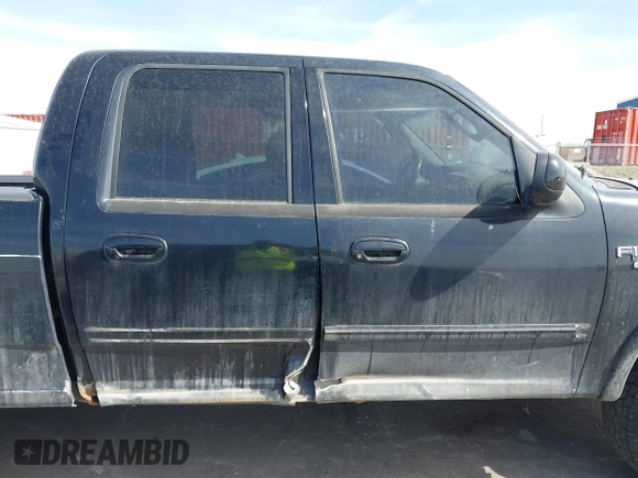 2003 Ford F-150 XLT with VIN 1FTRW08L83KA14760, listed as a IAAI auction lot 41820943 with 215,130 mi miles. Bid and sale history available at carsss.com. Image 6.