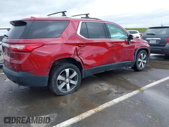 2018 Chevrolet Traverse LT Leather with VIN 1GNEVHKWXJJ186348, listed as a IAAI auction lot 41809269 with 134,861 mi miles. Bid and sale history available at carsss.com. Image 4.