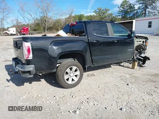 2018 GMC Canyon 2WD SLE with VIN 1GTG5CEN0J1309260, listed as a IAAI auction lot 41645904 with 144,011 mi miles. Bid and sale history available at carsss.com. Image 4.