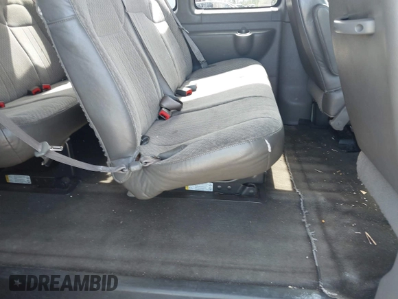 2014 Chevrolet Express Passenger 1LT with VIN 1GAZGYFG8E1130432, listed as a IAAI auction lot 42487756 with 176,418 mi miles and . Bid and sale history available at DreamBid. Image 8.