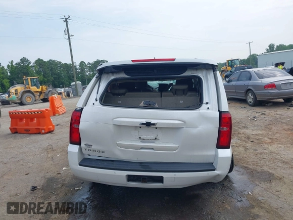 2019 Chevrolet Tahoe LT with VIN 1GNSKBKC3KR144850, listed as a IAAI auction lot 42420199 with Not provided miles and . Bid and sale history available at DreamBid. Image 16.