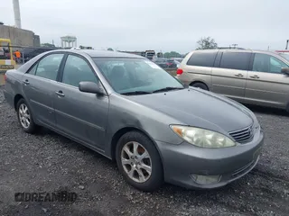 2006 Toyota Camry LE z VIN 4T1BF30K66U621606, wystawiony jako IAAI lot #42511021 z przebiegiem 164 345 mil mil oraz . Historia ofert i sprzedaży dostępna na DreamBid. Obrazek 1.