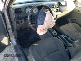 2002 Isuzu Rodeo z VIN 4S2CK57W524323426, wystawiony jako Copart lot #42191765 z przebiegiem 112 024 mil mil oraz Szkoda całkowita • Salvage title. Historia ofert i sprzedaży dostępna na DreamBid. Obrazek 8.