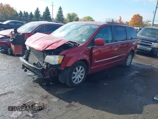 2013 Chrysler Town & Country Touring with VIN 2C4RC1BG0DR634631, listed as a IAAI auction lot 40686174 with 143,206 mi miles. Bid and sale history available at carsss.com. Image 18.