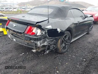 2020 Ford Mustang EcoBoost z VIN 1FATP8UH7L5131625, wystawiony jako IAAI lot #42295906 z przebiegiem 74 572 mil mil oraz . Historia ofert i sprzedaży dostępna na DreamBid. Obrazek 4.