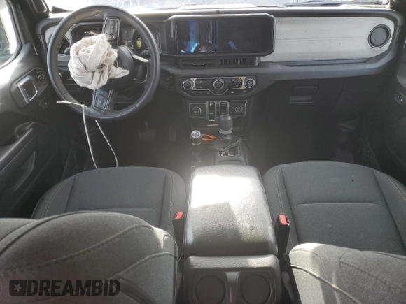 2024 Jeep Wrangler Sport S with VIN 1C4RJXN69RW147521, listed as a Copart auction lot 47298575 with 55,477 mi miles and Salvage Title. Bid and sale history available at DreamBid. Image 8.
