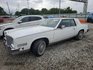 1985 Cadillac Eldorado z VIN 1G6EL5780FE670863, wystawiony jako Copart lot #57903255 z przebiegiem 72 534 mil mil oraz Czysty tytuł • Clean title. Historia ofert i sprzedaży dostępna na DreamBid. Obrazek 1.