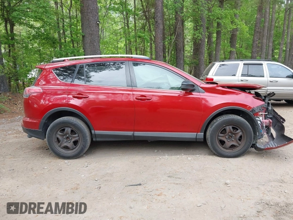 2016 Toyota RAV4 LE with VIN JTMZFREV4GJ062701, listed as a IAAI auction lot 42084694 with 121,553 mi miles and . Bid and sale history available at DreamBid. Image 14.