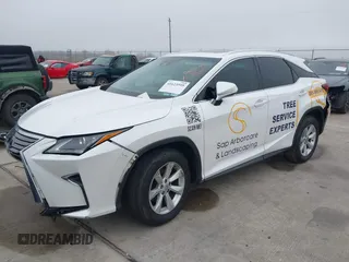 2016 Lexus RX 350 with VIN 2T2BZMCA5GC032156, listed as a IAAI auction lot 41623595 with 133,103 mi miles and . Bid and sale history available at DreamBid. Image 16.