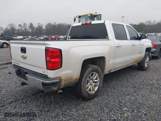 2016 Chevrolet Silverado 1500 LT with VIN 3GCPCREC7GG357789, listed as a IAAI auction lot 41521002 with 225,824 mi miles. Bid and sale history available at carsss.com. Image 4.