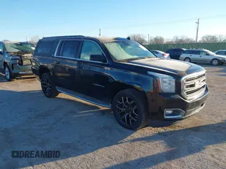 2015 GMC Yukon XL SLT with VIN 1GKS1HKC3FR250207, listed as a IAAI auction lot 41424234 with 183,233 mi miles. Bid and sale history available at carsss.com. Image 1.