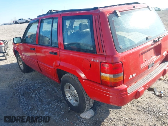 1998 Jeep Grand Cherokee Laredo with VIN 1J4GZ48Y6WC290798, listed as a IAAI auction lot 41816161 with 299,875 mi miles. Bid and sale history available at carsss.com. Image 3.