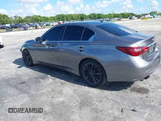 2014 Infiniti Q50 Premium with VIN JN1BV7AP7EM684448, listed as a IAAI auction lot 42564087 with 79,207 mi miles and . Bid and sale history available at DreamBid. Image 3.