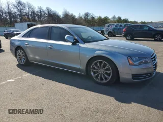2013 Audi A8 L 3.0L with VIN WAURGAFDXDN029613, listed as a Copart auction lot 54912115 with 105,940 mi miles and Clean Title. Bid and sale history available at carsss.com. Image 4.