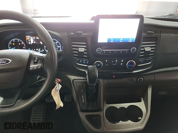 2020 Ford Transit Cargo z VIN 1FTBR2YG1LKA51866, wystawiony jako IAAI lot #42842416 z przebiegiem 141 231 mil mil oraz . Historia ofert i sprzedaży dostępna na DreamBid. Obrazek 3.