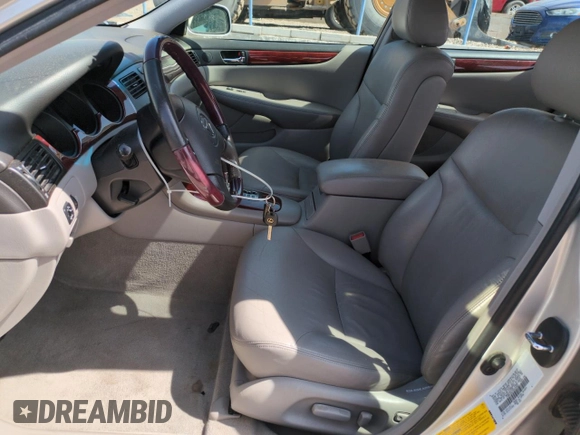 2002 Lexus ES 300 with VIN JTHBF30G725034964, listed as a Copart auction lot 51224395 with 100,097 mi miles and Salvage Title. Bid and sale history available at DreamBid. Image 7.
