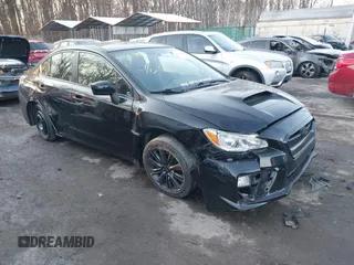 2015 Subaru WRX with VIN JF1VA1A60F9831858, listed as a IAAI auction lot 41360764 with 99,199 mi miles. Bid and sale history available at carsss.com. Image 1.