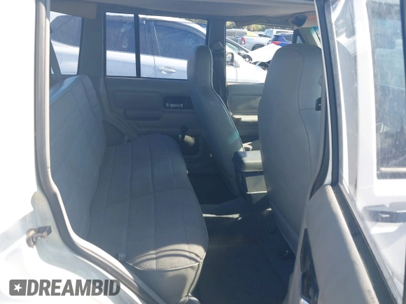 1996 Jeep Cherokee Sport with VIN 1J4FT68S7TL265733, listed as a IAAI auction lot 42499228 with 230,001 mi miles and . Bid and sale history available at DreamBid. Image 8.