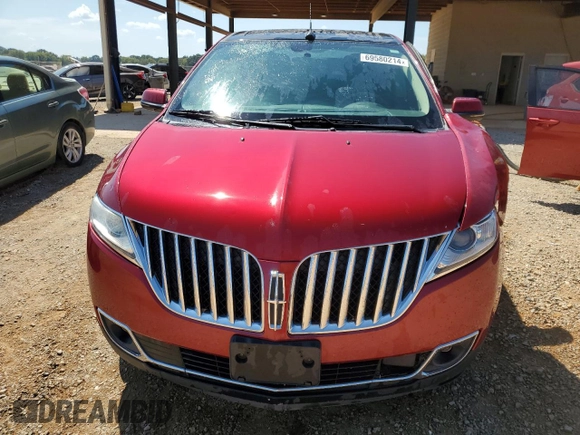 2013 Lincoln MKX with VIN 2LMDJ6JK9DBL19743, listed as a Copart auction lot 69580214 with 180,695 mi miles and Salvage Title. Bid and sale history available at DreamBid. Image 5.