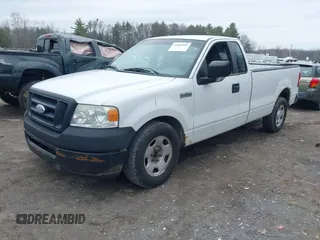 2007 Ford F-150 XL with VIN 1FTRF12257NA47662, listed as a IAAI auction lot 42003991 with 154,502 mi miles. Bid and sale history available at carsss.com. Image 2.