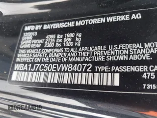 2014 BMW 2 Series M235i with VIN WBA1J7C50EVW84072, listed as a IAAI auction lot 41917841 with 102,745 mi miles and . Bid and sale history available at carsss.com. Image 9.