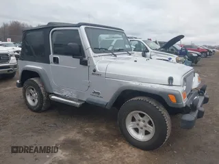 2004 Jeep Wrangler Sport with VIN 1J4FA49S64P749380, listed as a IAAI auction lot 41935405 with 84,690 mi miles. Bid and sale history available at carsss.com. Image 1.