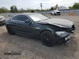 2012 BMW 6 Series 650i xDrive with VIN WBALX5C51CC893955, listed as a Copart auction lot 54828075 with Not Provided miles and Clean Title. Bid and sale history available at carsss.com. Image 4.