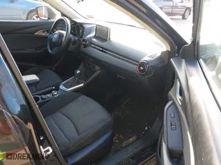 2016 Mazda CX-3 Sport with VIN JM1DKBB75G0124907, listed as a IAAI auction lot 42107232 with 128,411 mi miles. Bid and sale history available at carsss.com. Image 5.