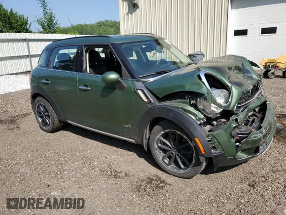 2015 MINI Countryman S with VIN WMWZC5C53FWP49039, listed as a Copart auction lot 60200335 with Not provided miles and Salvage title. Bid and sale history available at DreamBid. Image 4.