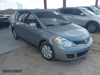 2011 Nissan Versa 1.8 SL with VIN 3N1BC1CP7BL446671, listed as a IAAI auction lot 42003858 with 96,939 mi miles. Bid and sale history available at carsss.com. Image 1.