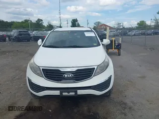 2013 Kia Sportage LX with VIN KNDPB3A20D7499468, listed as a IAAI auction lot 42090424 with 241,104 mi miles. Bid and sale history available at carsss.com. Image 6.