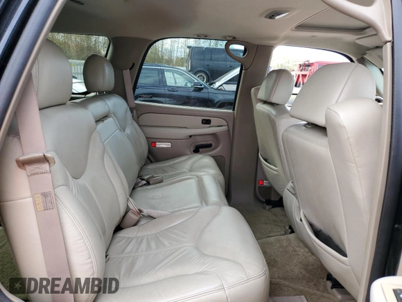 2002 GMC Yukon SLT z VIN 1GKEK13Z52J184367, wystawiony jako Copart lot #75938904 z przebiegiem 119 717 mil mil oraz Szkoda całkowita • Salvage title. Historia ofert i sprzedaży dostępna na DreamBid. Obrazek 11.