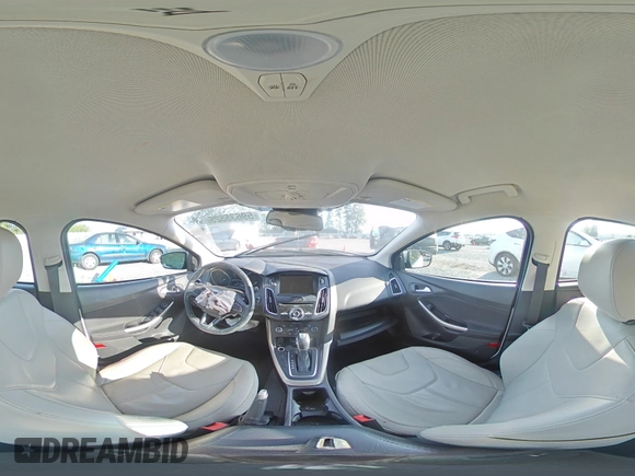 2015 Ford Focus Titanium z VIN 1FADP3N24FL262321, wystawiony jako Copart lot #59635525 z przebiegiem Nie podano mil oraz Szkoda całkowita • Salvage title. Historia ofert i sprzedaży dostępna na DreamBid. Obrazek 16.