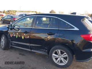 2013 Acura RDX with VIN 5J8TB4H3XDL019481, listed as a IAAI auction lot 41235509 with 129,024 mi miles. Bid and sale history available at carsss.com. Image 14.
